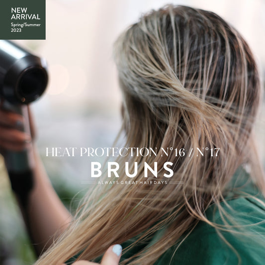 Woman blow drying her hair