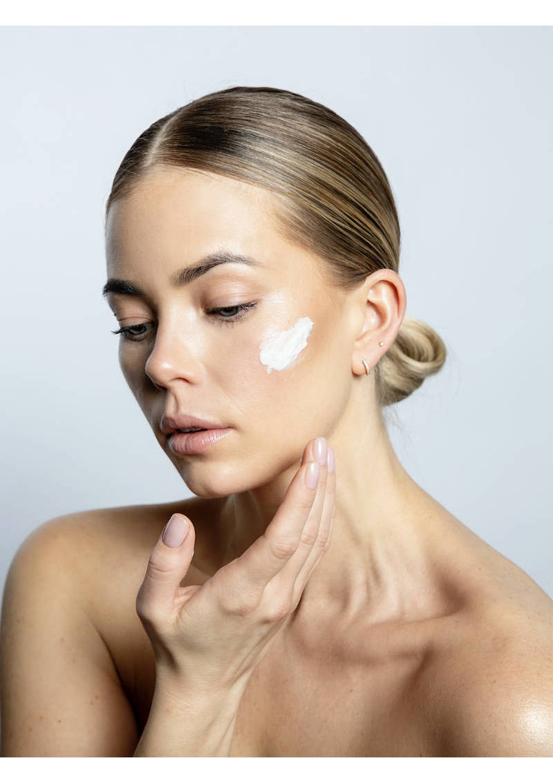 Woman using Bagliora Nourishing Anti Age Day Cream