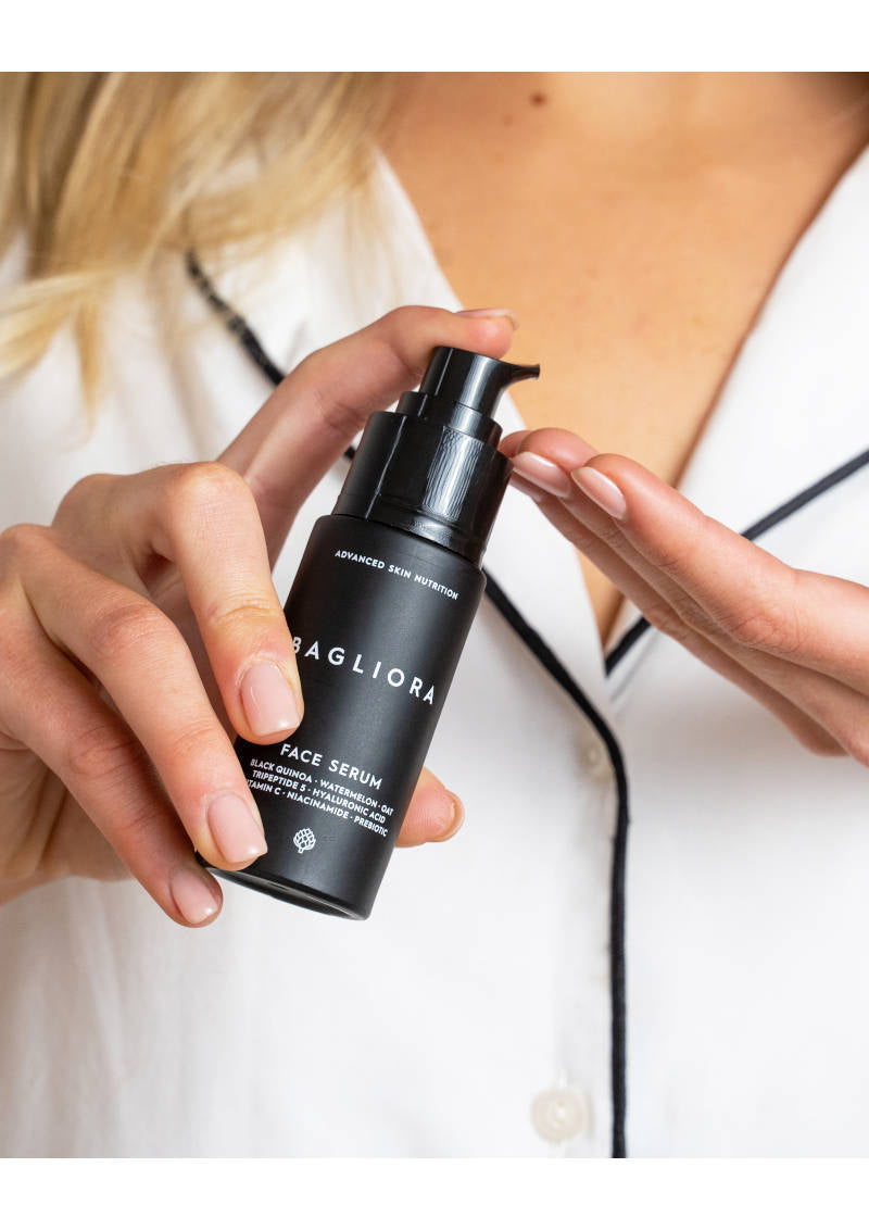Woman using Bagliora Superfoods Serum