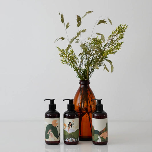 KLINT Hand Cream / Handcreme, art by Yanii, 3 bottles in front of a vase with dried flowers