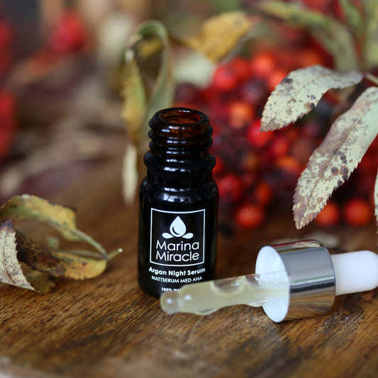 MARINA MIRACLE Argan Night Serum, Nachtserum, bottle + autumn leaves