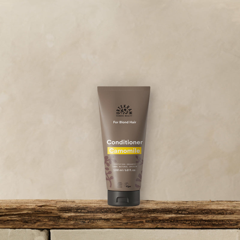 URTEKRAM Conditioner for blonde hair, Camomile. Bottle on a shelf. 