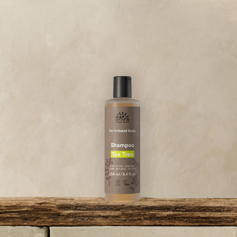 URTEKRAM Shampoo for irritated scalp, Tea Tree, bottle of a shelf